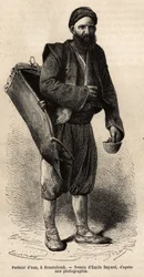 Een waterdrager, rondtrekkende handelaar poserend met zijn uitrusting, een soort tankdoos en een container gebruikt als maat en beker, in Roestchouk (Roemenië), gravure naar de tekening van Emile Bayard, illustrerend de reis naar Bulgarije, door Guillaume 