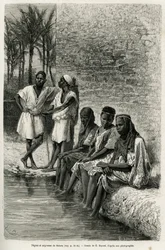 Zwarte mannen en vrouwen uit de Sahara, aan de oevers van de Oued Rir. Gravure door E. Bayard ter illustratie van De Algerijnse Sahara door V. Largeau, 1874-1878, gepubliceerd in Le Tour du monde onder leiding van Édouard Charton (1807-1890)