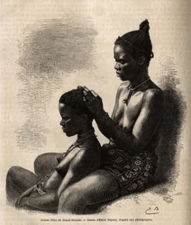 Jonge meisjes van Grand-Bassam (voormalige hoofdstad van Ivoorkust), zichzelf kappend, gravure naar de tekening van Emile Bayard, illustrerend de reis naar de Afrikaanse kust in 1868, door vice-admiraal Fleuriot de Langles, gepubliceerd in "Le tour du mond