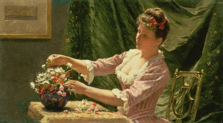 Jonge vrouw die bloemen rangschikt