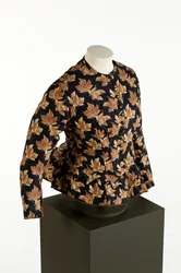 Zwart lijfje met bedrukt goudbruin esdoornbladmotief, ca. 1860-70, katoen