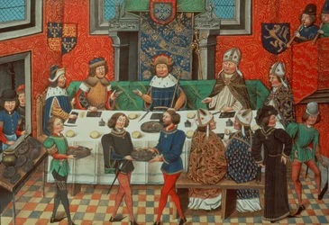 Roy 14 E IV f.244v, De hertog van Lancaster dineert met de koning van Portugal, uit deel III 