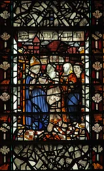 Raam w58 met St. Thomas Becket met een gevangene en 2 andere figuren