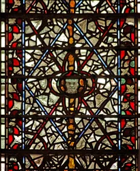 Raam w59 met grisaille en een hoofd