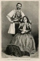 Portretten van vorst Nicolaas I Petrović-Njegoš van Montenegro (1841-1921) en zijn vrouw Milena, geboren Vukotić (1847-1923), tekening door E. Ronjat ter illustratie van de reis naar Montenegro in 1874 door Charles Yriarte (1832-1898). Gravure in Le Tour