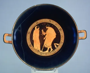 Attische roodfigurige beker met een man die een jongen een haan geeft, ca. 470 v.Chr.