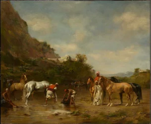 Arabieren die hun paarden drenken
