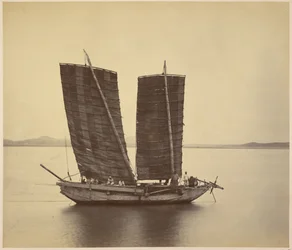 De eerste Koreaanse jonk die zendingen aan boord van de U.S.S. Colorado brengt, meteen nadat het anker is uitgegooid