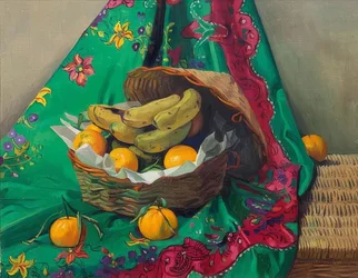Mandarijnen en bananen in een mand