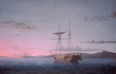 Houtvrachtschepen in de avond op Penobscot Bay