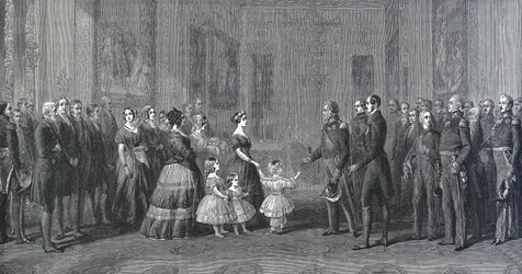 De koningin van Engeland Victoria ontvangt Louis-Philippe I, koning van Frankrijk in Windsor Castle, 8 oktober 1844. Gravure naar een schilderij van Winterhalter