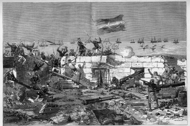 Tunesië, juli 1881: Franse troepen namen de stad Stax in na de opstand van de inwoners tegen het Franse protectoraat van Tunesië. Mariniers nemen de cirkelvormige batterij in. Gravure door De Haenen in 