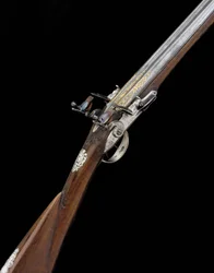 Een fijne en zeldzame 20-bore zilver-gemonteerde Franse D.B. vuursteen sportgeweer, ca. 1725