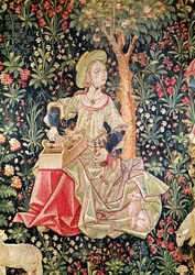 Een vrouw aan het spinnen, detail (Le Travail de la Laine, deel van La Noble Pastorale, ca. 1500)
