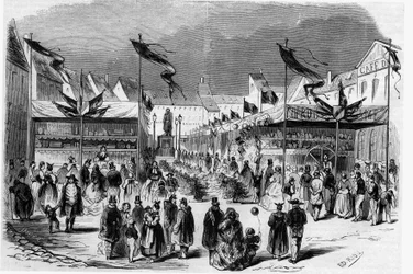 Kerstfeest in de Elzas: de Kerstmarkt (van het Kindje Jezus) in Straatsburg in 1857. Gravure in 
