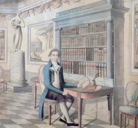 Heer die in zijn bibliotheek leest