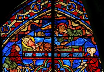 Pelgrims en een engel bij het graf van Thomas Becket