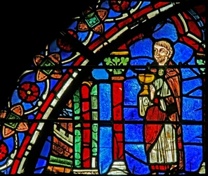 St. Cheron raam: priester met kelk