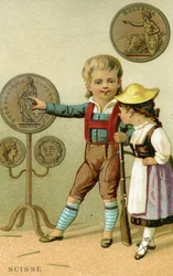Zwitserse jongen en meisje die een etalage met Zwitserse francs bewonderen, uit een serie promotiekaarten over valuta in verschillende landen, gepubliceerd in Parijs door Baster & Vieillemard voor gebruik door de chocoladeproducent