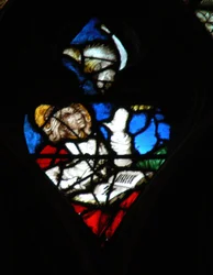 Het westelijke roosvenster met een scène uit het Boek Openbaring: Opening van het vierde zegel, met de adelaar van St. Johannes (6:7)