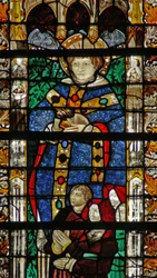 Raam w204 met St. Séverin en een familie van schenkers