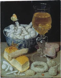 Stilleven met brood en zoetigheden