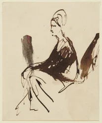 Zittende vrouwenfiguur