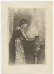 Vrouw bij een wastobbe