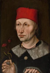 Portret van een man met een rode pet