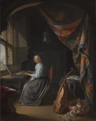 Een dame die op een klavichord speelt.