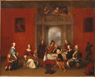 Groepsportret van een familie in een elegant interieur