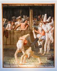 Het poortgebouw van de acrobaten