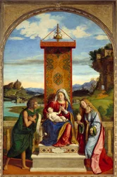 De Maagd heeft een kind tussen Sint Johannes de Doper en Sint Maria Magdalena.