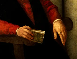 Vermoedelijk portret van Francois Rabelais (1494-1553), Franse schrijver en arts. Detail van het boek dat hij in zijn hand houdt en van de ridder die hij aan zijn vinger draagt. Schilderij door Giovanni Battista Moroni (1525-1578)