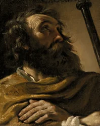 Sint Alexius in een bruine omslagdoek, met een staf in de hand