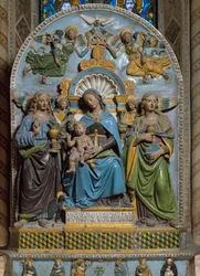 De Maagd en Kind met Sint Madeleine en Sint Johannes Evangelist
