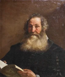 Portret van een oude man met een boek