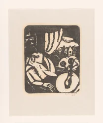 Vrouw zittend bij een venster