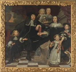 Een familie op het terras van een landhuis