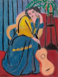 Meisje in geel en blauw met gitaar