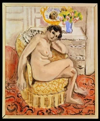 Naakt in een leunstoel