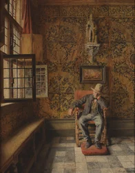 De man in de stoel