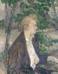 Vrouw zittend in een tuin