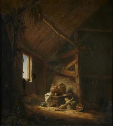 Een interieur van een schuur met licht door een raam