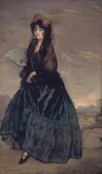 Vrouw met mantilla, bloemen en waaier