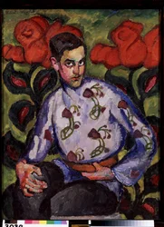 Portret van een jongen met een bloemenhemd.