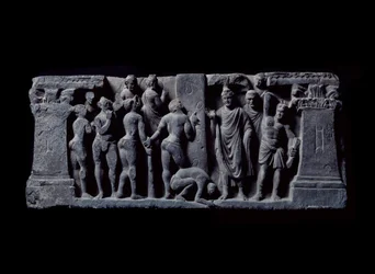 Kunst van Gandhara (of Grieks-Boeddhisme): "Boogschutters van Devadatta vallen Gautama aan" Reliëf van de Gandhara School - 2e tot 4e eeuw - Indian Museum, Calcutta India
