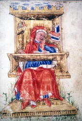 Een Joodse man die in een stoel schrijft