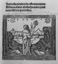 Een astronoom die naar de sterren kijkt, uit Introductorium in astronomiam, gepubliceerd in Venetië 1506