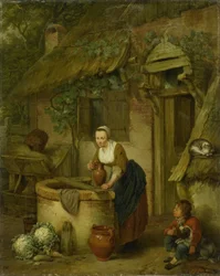 Vrouw die water uit een put haalt